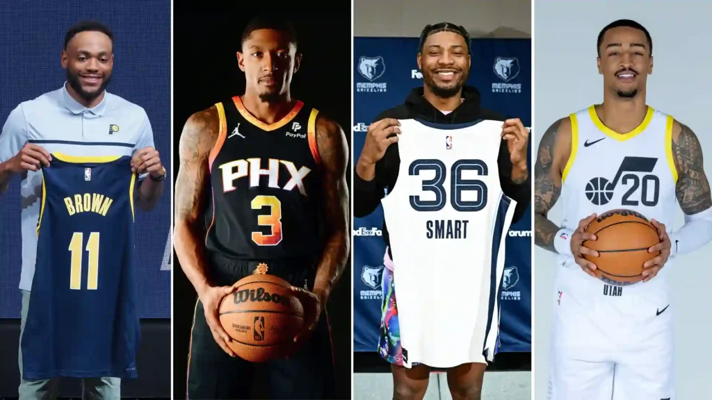 Four NBA players holding jerseys during offseason travel.